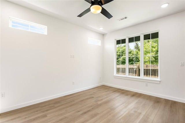 730 N 5th St, Rogers, AR 72756 - spare room with ceiling fan, light wood finished floors, and recessed lighting