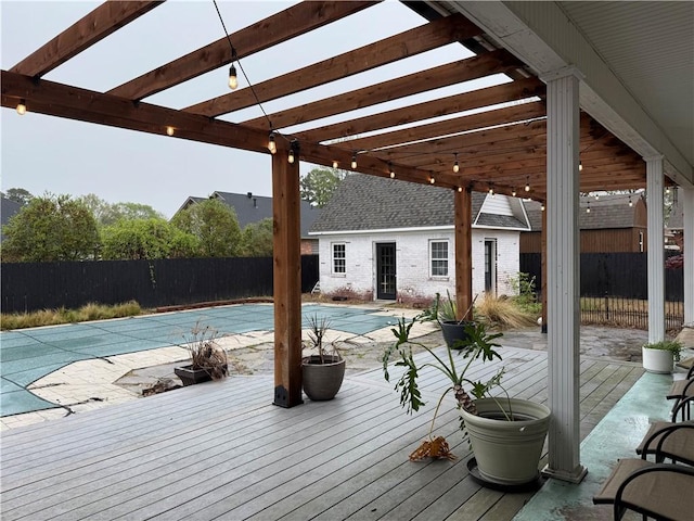 2110 W 8th St, Russellville, AR 72801 - deck with a pergola, a fenced backyard, and an outbuilding