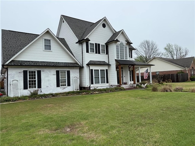 2110 W 8th St, Russellville, AR 72801 - traditional home with covered porch, a shingled roof, and brick siding