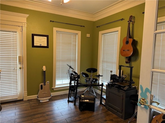2110 W 8th St, Russellville, AR 72801 - dining space with crown molding, baseboards, and dark wood-style flooring