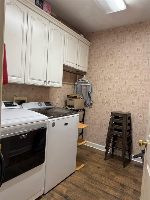 2110 W 8th St, Russellville, AR 72801 - laundry area with cabinet space, washing machine and dryer, wallpapered walls, dark wood-style floors, and baseboards