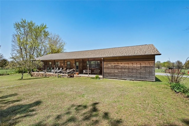 2230 Reed Ave, Springdale, AR 72764 - back of property with a lawn