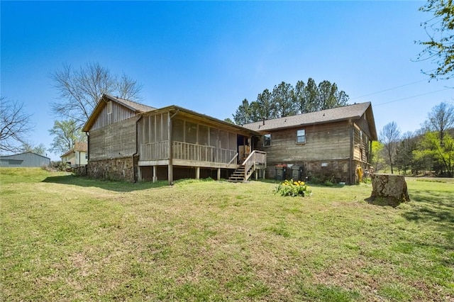 2230 Reed Ave, Springdale, AR 72764 - rear view of property featuring a yard and a sunroom