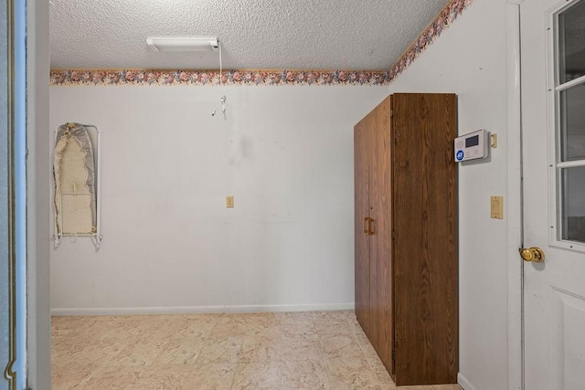 3906 Chapman Ave, Springdale, AR 72762 - empty room with a textured ceiling and baseboards