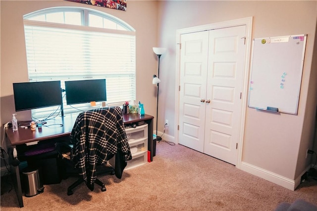 office area featuring carpet floors and baseboards