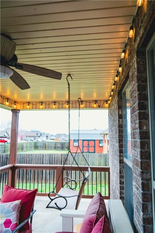 balcony featuring ceiling fan