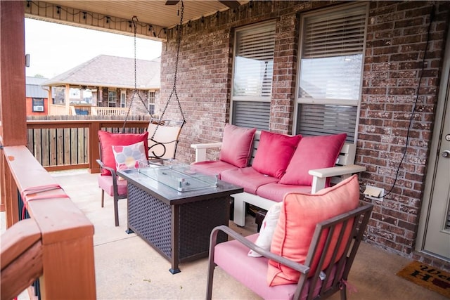 view of patio / terrace with a ceiling fan and outdoor lounge area