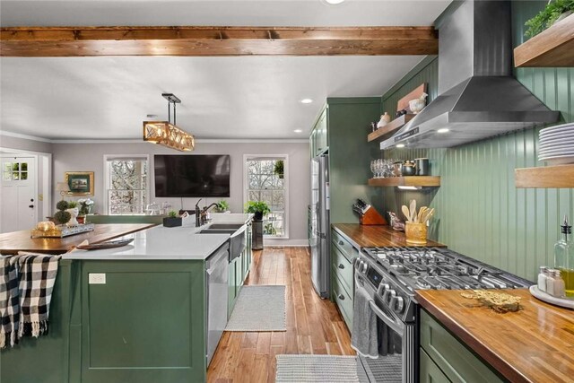 1617 N Applebury Dr, Fayetteville, AR 72701 - kitchen featuring wall chimney exhaust hood, butcher block counters, open shelves, appliances with stainless steel finishes, and green cabinetry