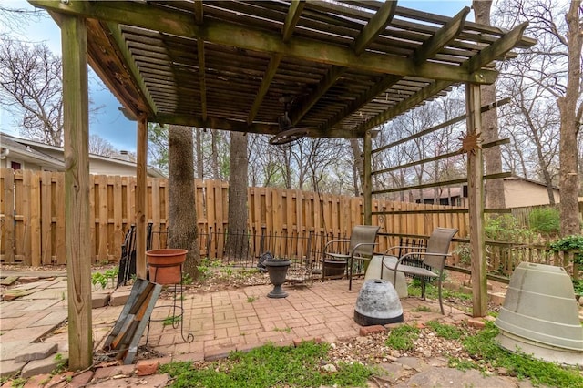 view of patio with fence and a pergola