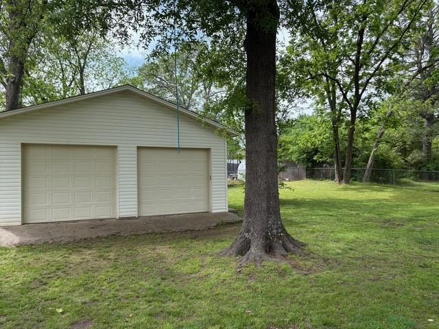 405 Ave 2, Atkins, AR 72823 - detached garage with fence