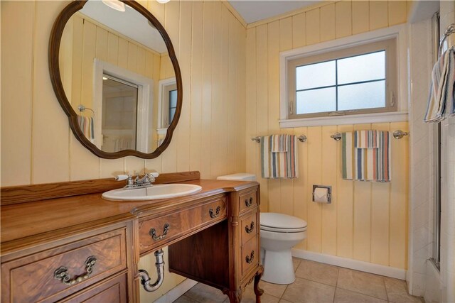 203 N Oklahoma Way, Fayetteville, AR 72701 - full bathroom with toilet, tile patterned flooring, vanity, a shower, and baseboards