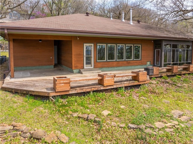 203 N Oklahoma Way, Fayetteville, AR 72701 - back of house featuring a deck and roof with shingles