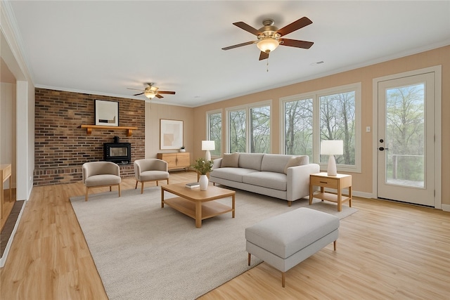 203 N Oklahoma Way, Fayetteville, AR 72701 - living area featuring ceiling fan, wood finished floors, plenty of natural light, and ornamental molding
