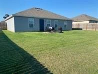 817 Evans Cir, Bentonville, AR 72713 - back of house with a yard and fence
