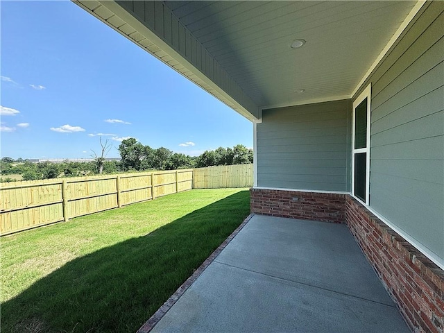 4903 SW Wakanda St, Bentonville, AR 72713 - fenced backyard with a patio area