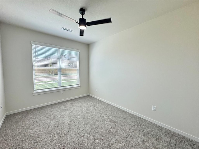 4903 SW Wakanda St, Bentonville, AR 72713 - carpeted spare room featuring ceiling fan and baseboards