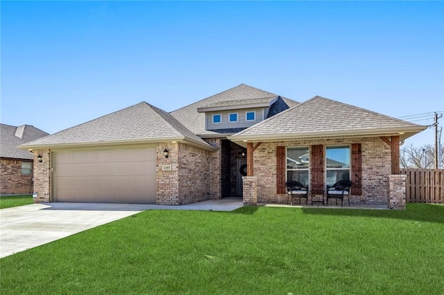 2405 Armstrong Ln, Pea Ridge, AR 72751 - view of front of property with a garage, driveway, brick siding, and a shingled roof