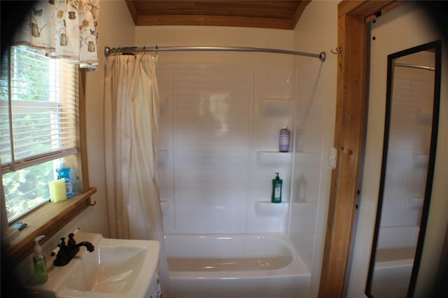 bathroom with a sink and shower / bath combo