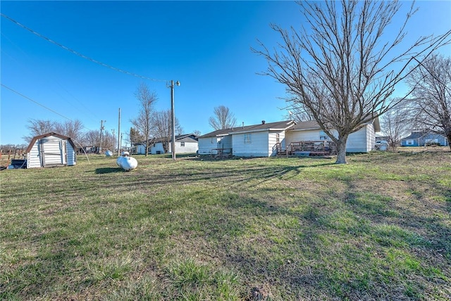 11775 Walters Rd, Bentonville, AR 72712 - view of yard featuring an outbuilding and a shed