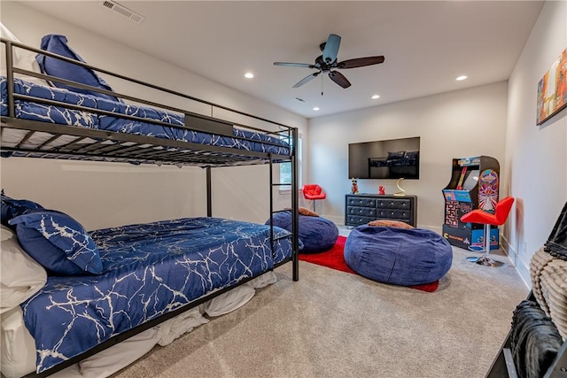 carpeted bedroom featuring baseboards, a ceiling fan, visible vents, and recessed lighting