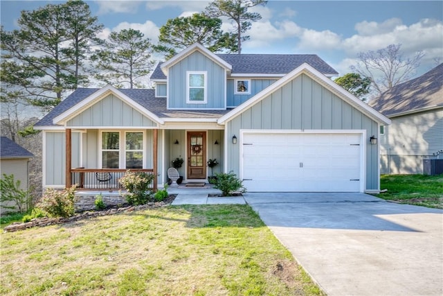 18 Hambleton Dr, Bella Vista, AR 72714 - view of front of property featuring a porch, driveway, board and batten siding, and an attached garage