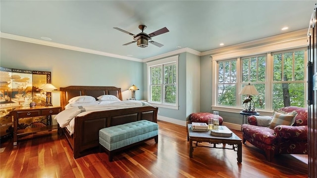 bedroom featuring baseboards, wood finished floors, ornamental molding, recessed lighting, and a ceiling fan