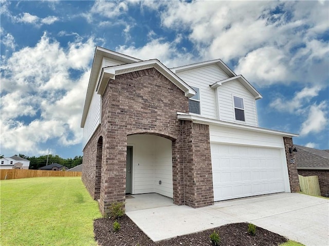 1963 Larkspur St, Springdale, AR 72762 - traditional home featuring an attached garage, concrete driveway, brick siding, and stone siding