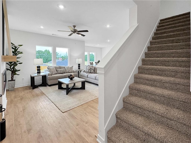 1963 Larkspur St, Springdale, AR 72762 - living room featuring stairway, a ceiling fan, light wood-type flooring, and recessed lighting