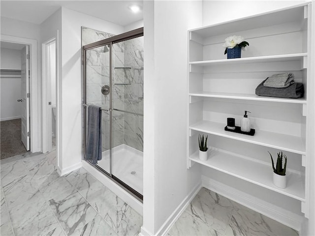 1963 Larkspur St, Springdale, AR 72762 - full bathroom with marble look tiles, a stall shower, and a spacious closet