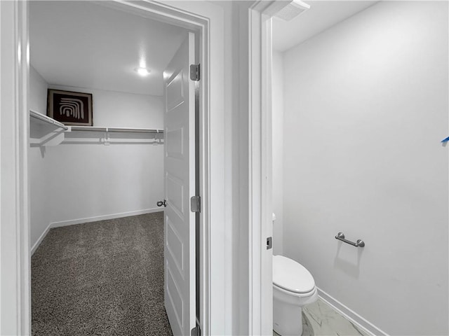 1963 Larkspur St, Springdale, AR 72762 - bathroom featuring baseboards and toilet