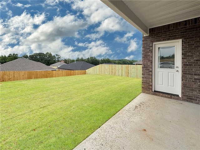 1963 Larkspur St, Springdale, AR 72762 - fenced backyard with a patio