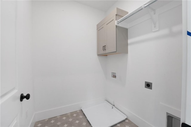 1401 W Brooks Pl, Rogers, AR 72758 - washroom with electric dryer hookup, cabinet space, washer hookup, and tile patterned floors