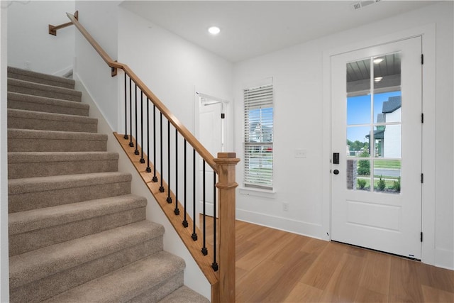 1401 W Brooks Pl, Rogers, AR 72758 - entrance foyer featuring light wood-style floors, stairway, and recessed lighting
