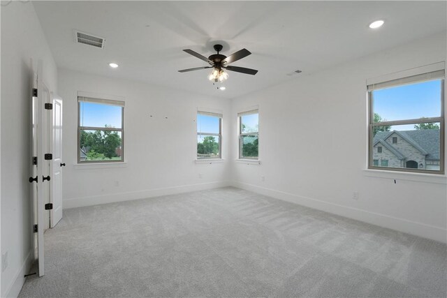 1401 W Brooks Pl, Rogers, AR 72758 - empty room featuring plenty of natural light, light colored carpet, recessed lighting, and ceiling fan