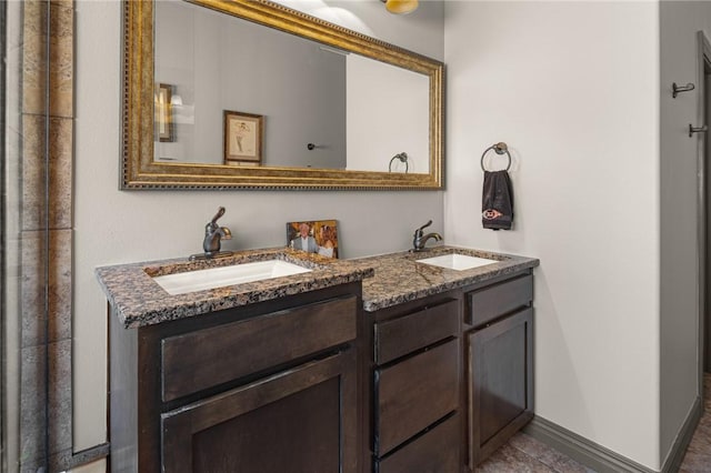 21413 Lakeview Dr, Garfield, AR 72732 - bathroom featuring double vanity, baseboards, and a sink