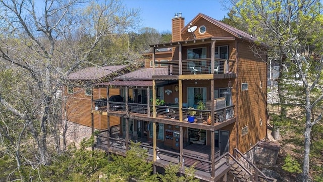 21413 Lakeview Dr, Garfield, AR 72732 - rear view of property featuring a balcony and a chimney