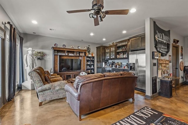 21413 Lakeview Dr, Garfield, AR 72732 - living room featuring recessed lighting, concrete floors, a dry bar, and ceiling fan