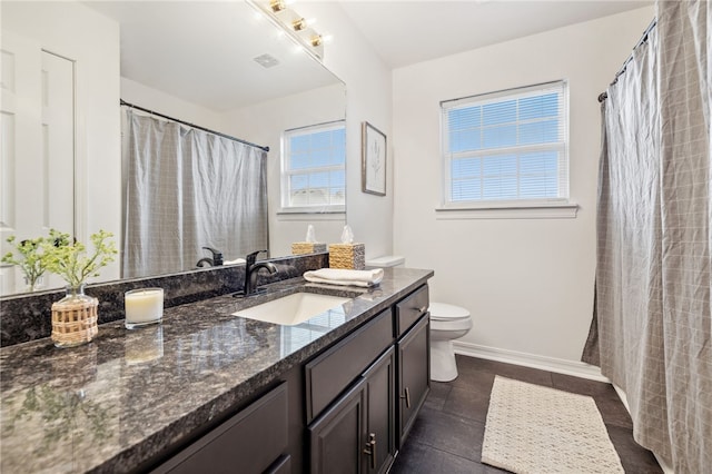 full bath with visible vents, baseboards, toilet, vanity, and tile patterned flooring