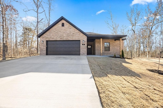 11 Newburgh Ln, Bella Vista, AR 72715 - single story home with brick siding, an attached garage, and concrete driveway