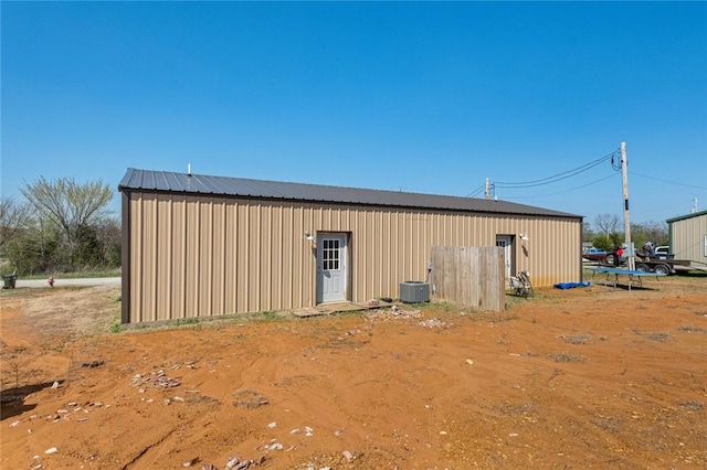 view of pole building with central AC unit
