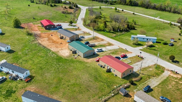 birds eye view of property featuring a rural view