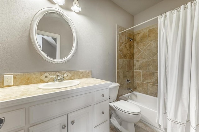 bathroom featuring shower / bath combination with curtain, vanity, a textured wall, and toilet