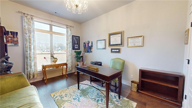office space featuring baseboards, a notable chandelier, dark wood finished floors, and visible vents