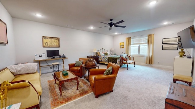 living room featuring carpet floors, a ceiling fan, and recessed lighting