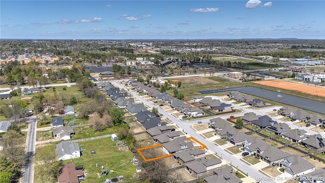 birds eye view of property with a residential view