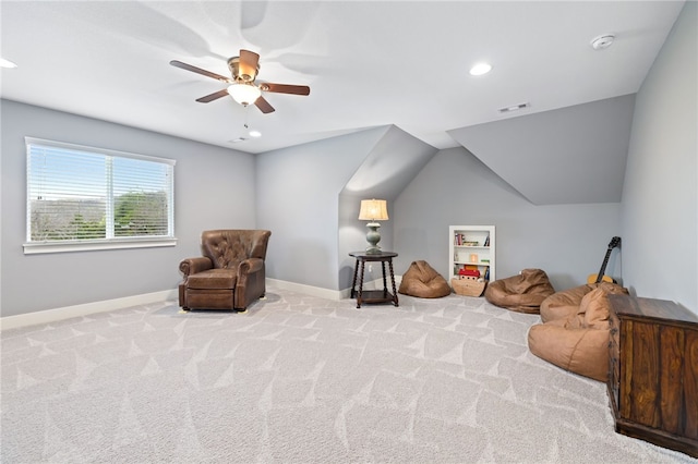 sitting room featuring ceiling fan, baseboards, visible vents, and carpet floors