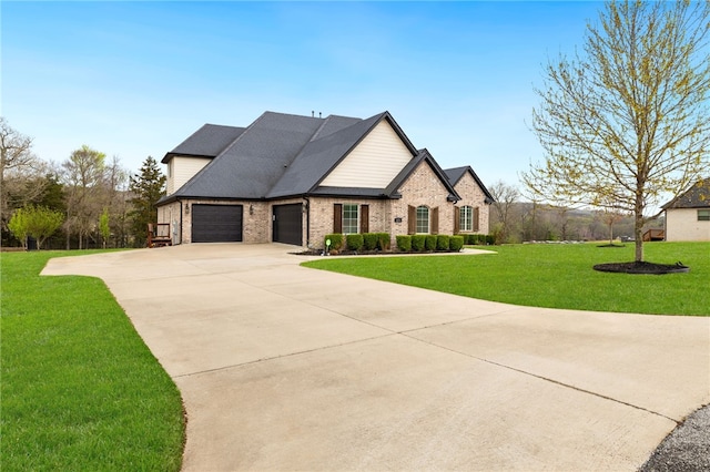 french provincial home featuring brick siding, driveway, an attached garage, and a front lawn