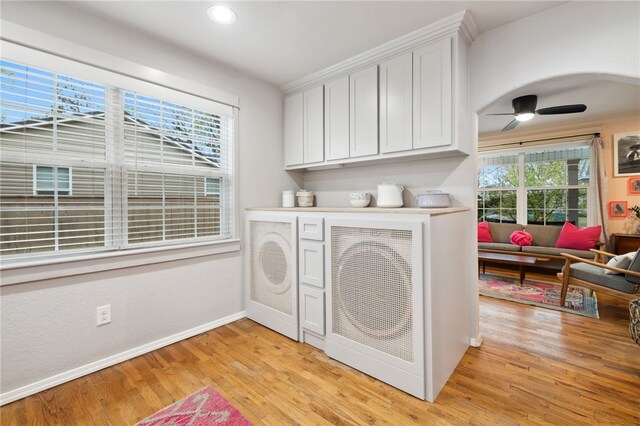 708 NW B St, Bentonville, AR 72712 - laundry area featuring a ceiling fan, washer / dryer, light wood finished floors, baseboards, and recessed lighting