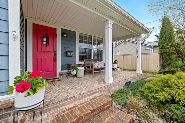 708 NW B St, Bentonville, AR 72712 - entrance to property with fence and covered porch
