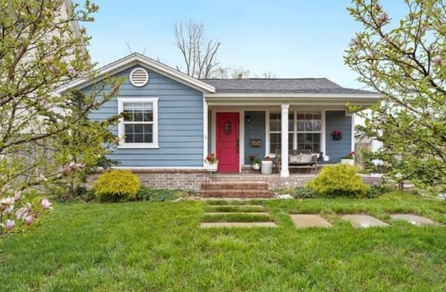 708 NW B St, Bentonville, AR 72712 - ranch-style home with a porch and a front lawn